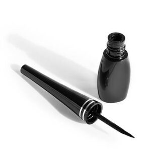 Open black eyeliner on a white background isolated